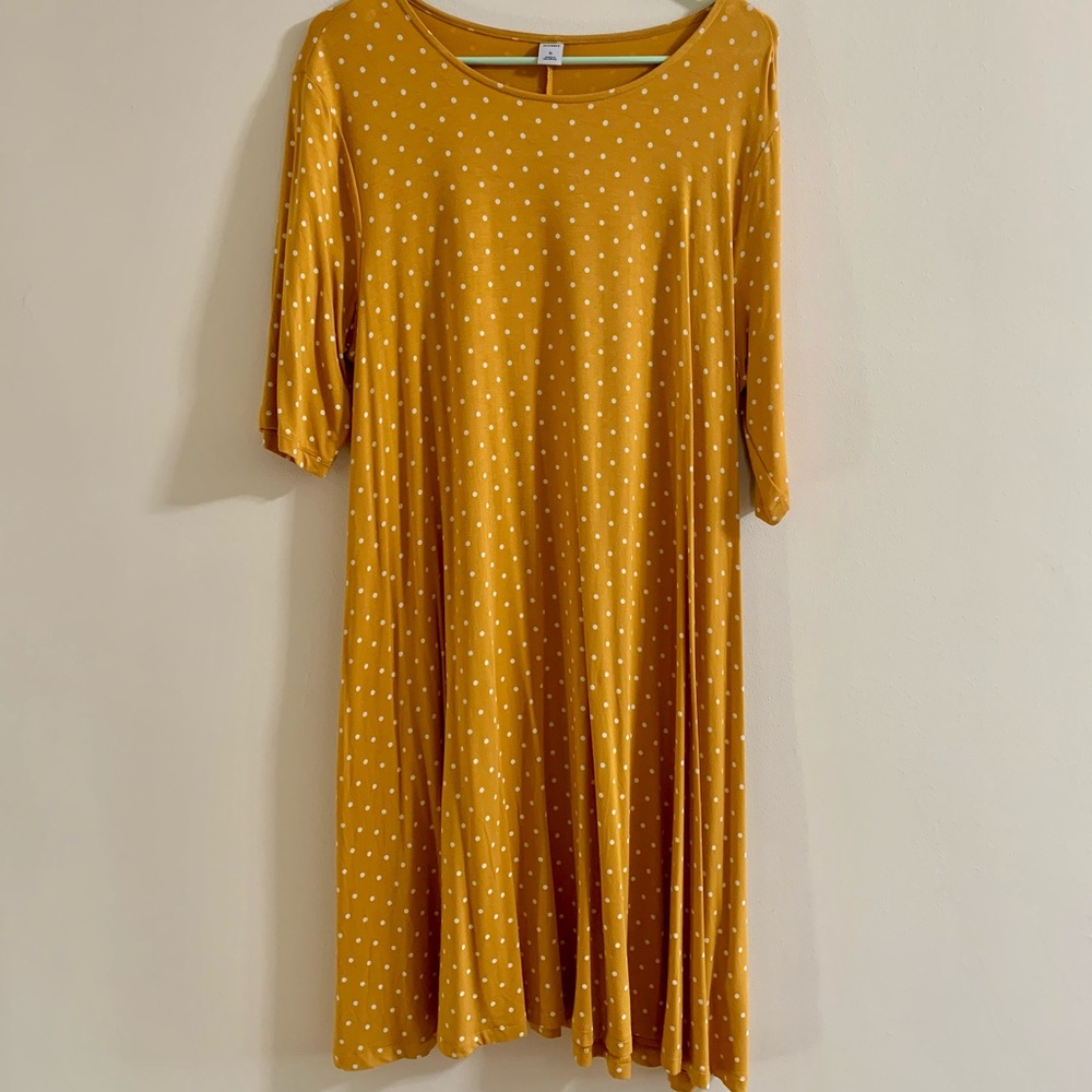 Yellow dress with white polka dots